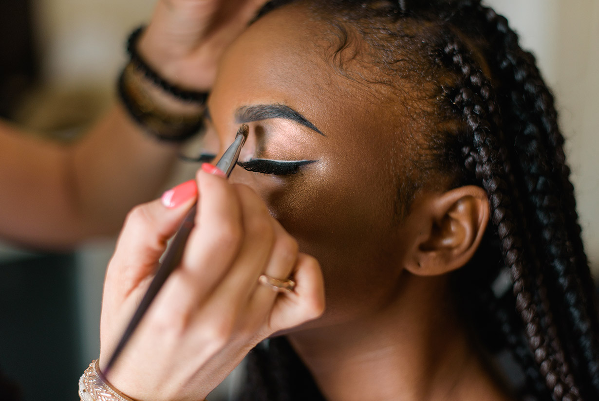 Makeup artist applying eyeshadow